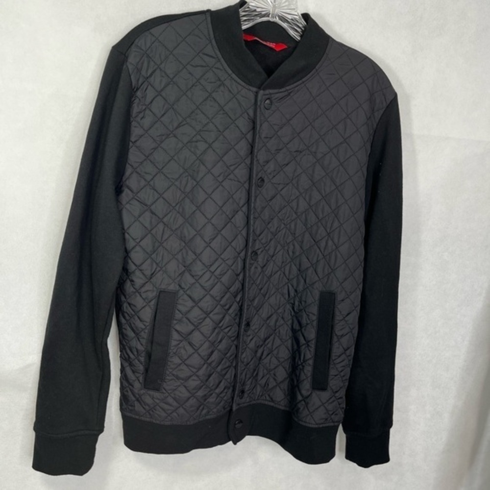 Quilted black sweater jacket by Zara